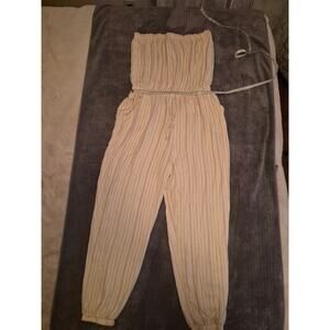 Indigo Rose Spring/Summer Size L Ivory stripped sleeveless jumpsuit.